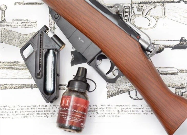 To facilitate quicker and practical loading for the BBs, the Mosin-Nagant design is altered for use of a removable box magazine that contains the CO2 cartridge and 16 steel BBs_ The 10-meter range test was done with